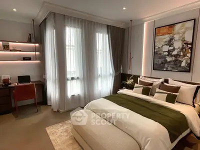 Luxurious bedroom with elegant decor and natural light