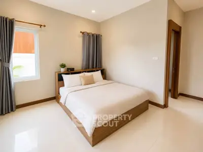 Modern bedroom with minimalist design and natural light