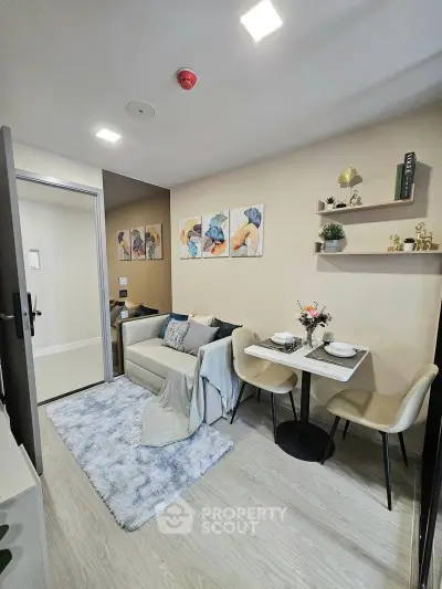 Modern living room with cozy dining area and stylish decor