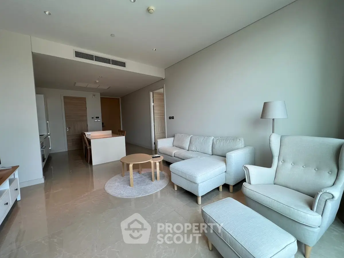 Spacious modern living room with elegant furniture and open layout