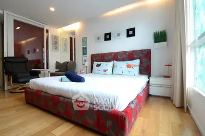 Stylish bedroom with modern decor and natural light