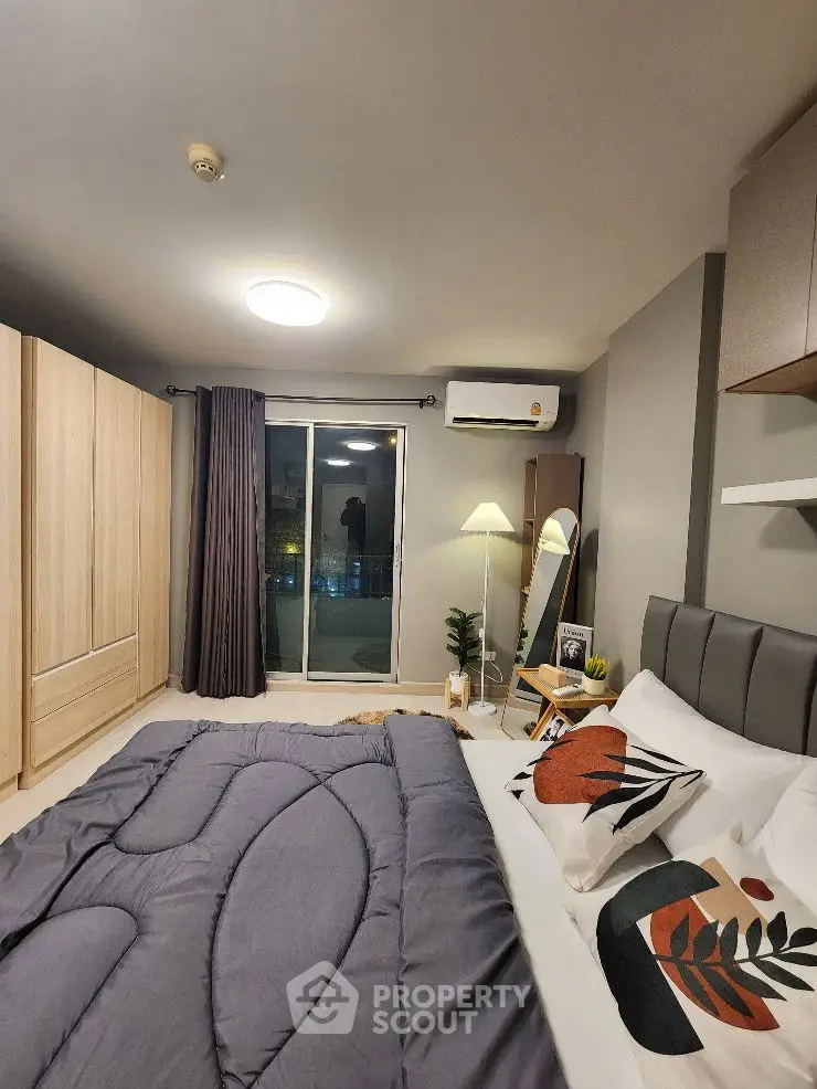 Modern bedroom with cozy bedding and stylish decor