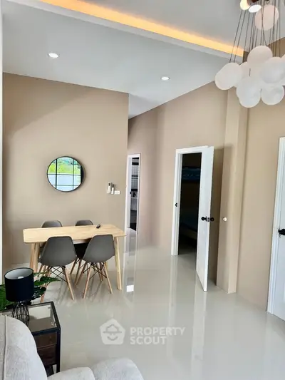 Modern living room with dining area and stylish decor