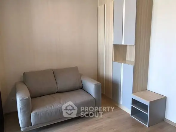 Cozy living room with modern sofa and stylish storage unit