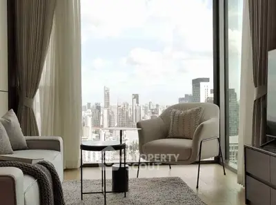 Luxurious living room with panoramic city view and modern furnishings.