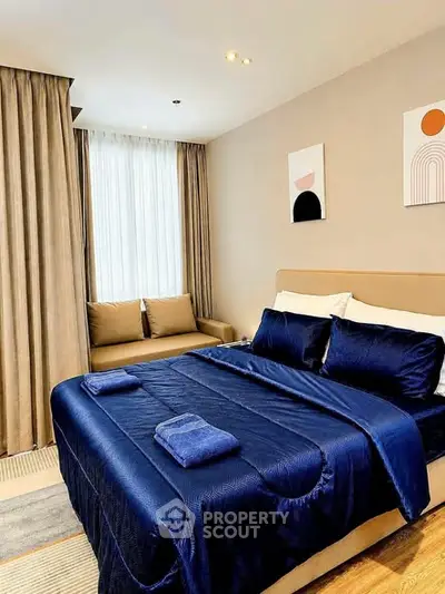 Luxurious bedroom with elegant decor and natural light
