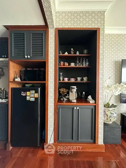 Charming kitchen nook with modern appliances and elegant cabinetry