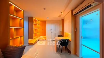 Modern living room with built-in shelves and ambient lighting