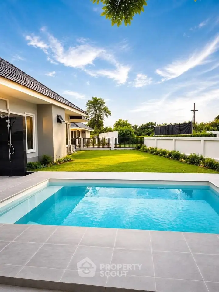 Luxurious modern home with private pool and lush garden, perfect for relaxation and entertaining.