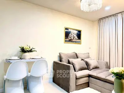 Modern living room with elegant decor and cozy seating area