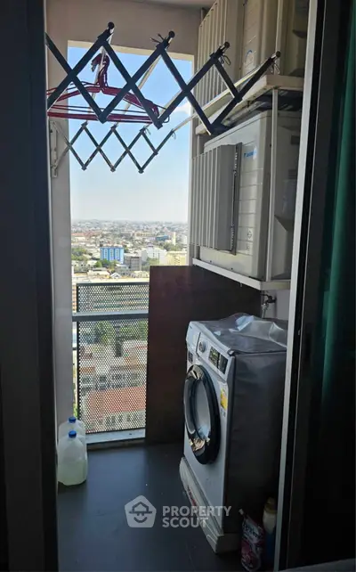 Stunning high-rise balcony with panoramic city views and modern railing design.