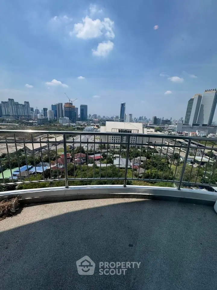Stunning cityscape view from a high-rise balcony, perfect for urban living enthusiasts.