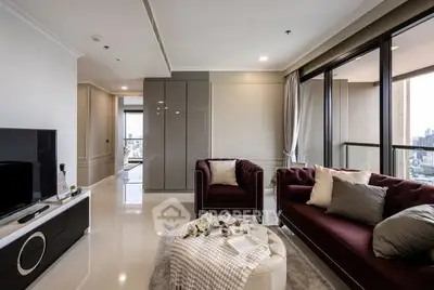 Luxurious modern living room with elegant furniture and city view balcony