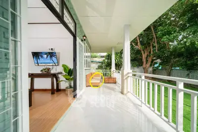 Spacious balcony with garden view and modern interior design