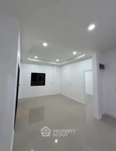 Spacious modern interior with sleek lighting and glossy floors, perfect for customization.