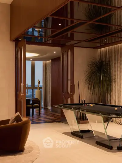 Luxurious living room with pool table and elegant decor in high-end apartment.