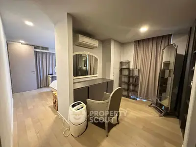 Spacious bedroom with elegant decor and modern air conditioning unit