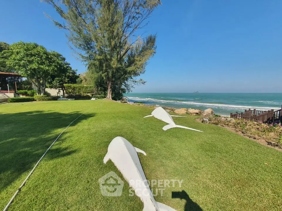 Stunning oceanfront garden with lush greenery and scenic sea views
