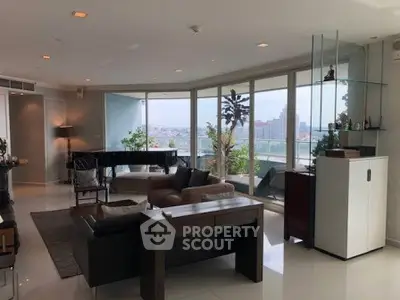 Luxurious living room with panoramic city views and elegant decor