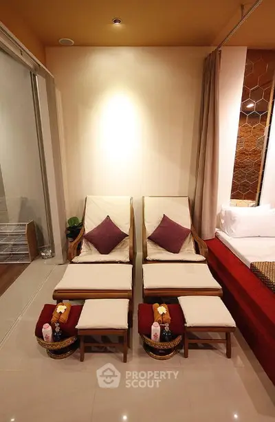 Luxurious spa-like relaxation area with elegant seating and ambient lighting