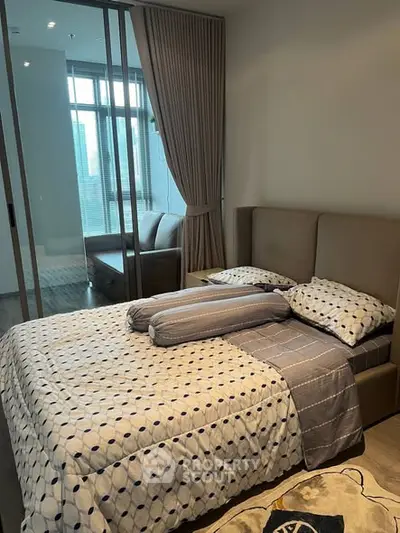 Cozy bedroom with modern decor and large window view