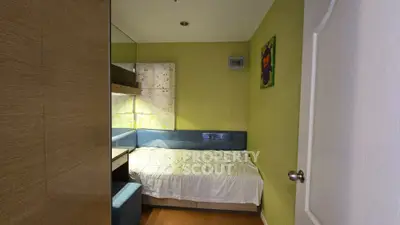 Cozy compact bedroom with modern design and vibrant wall art
