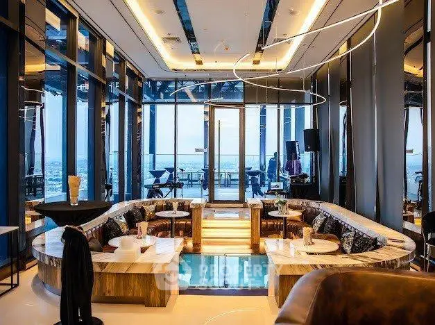 Luxurious modern living room with panoramic city views and stylish decor