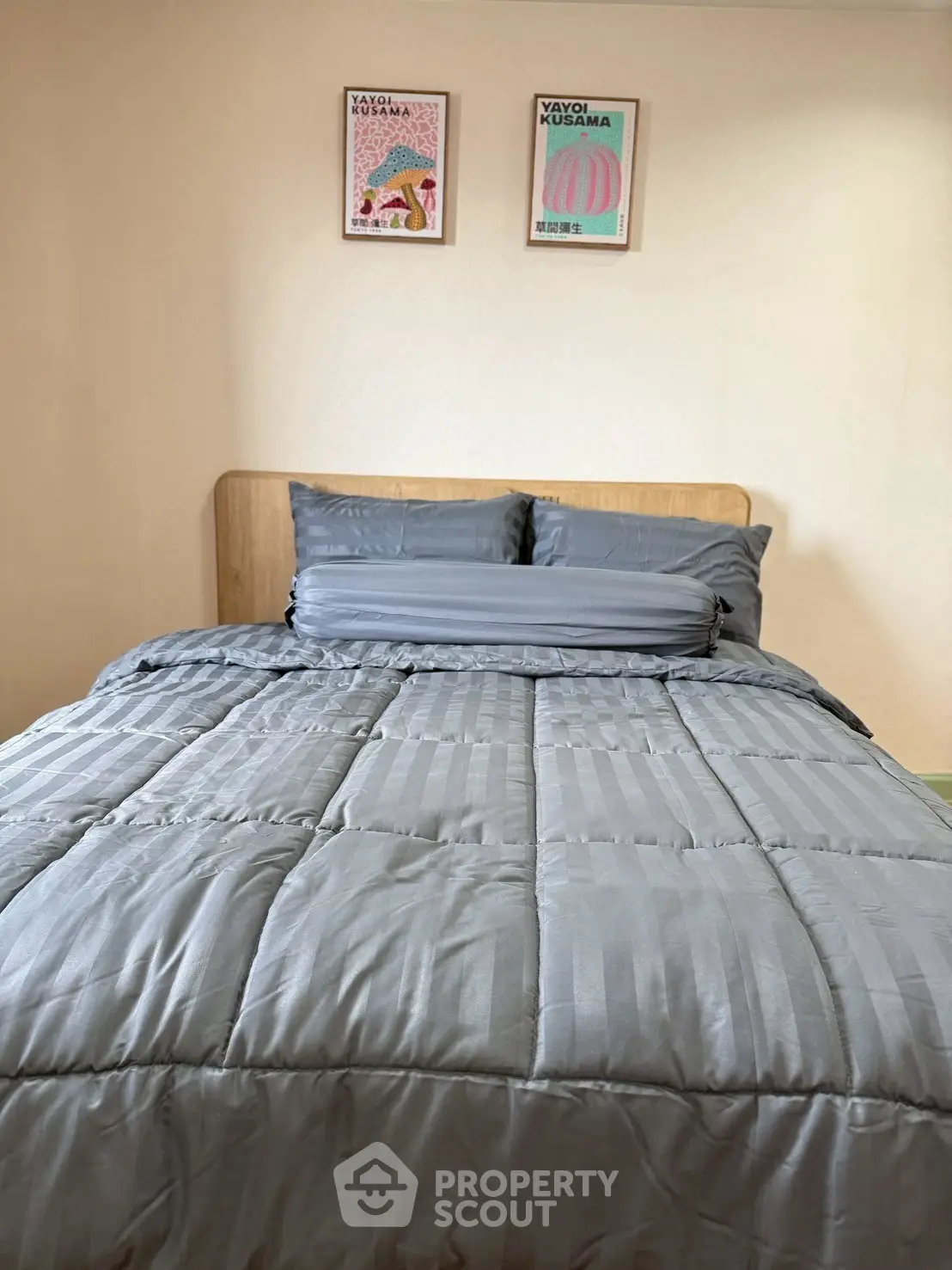 Cozy bedroom with modern decor and plush bedding