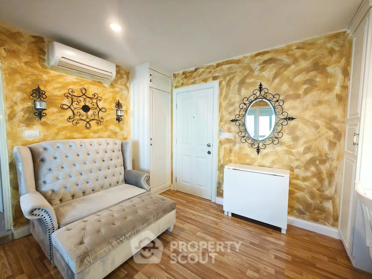 Charming living room with elegant sofa and artistic wall decor
