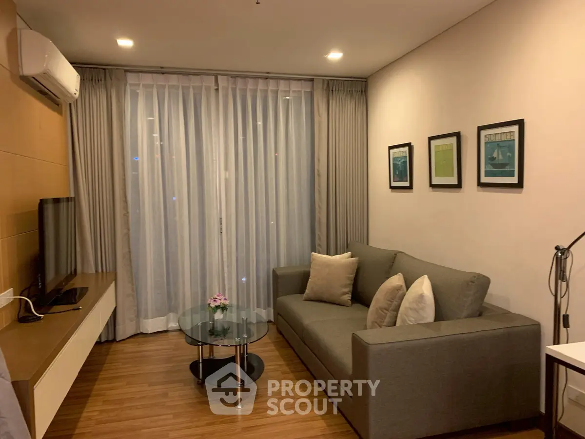 Cozy modern living room with stylish decor and natural light