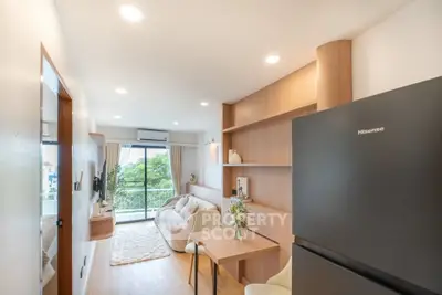 Modern living room with open layout and balcony view in stylish apartment