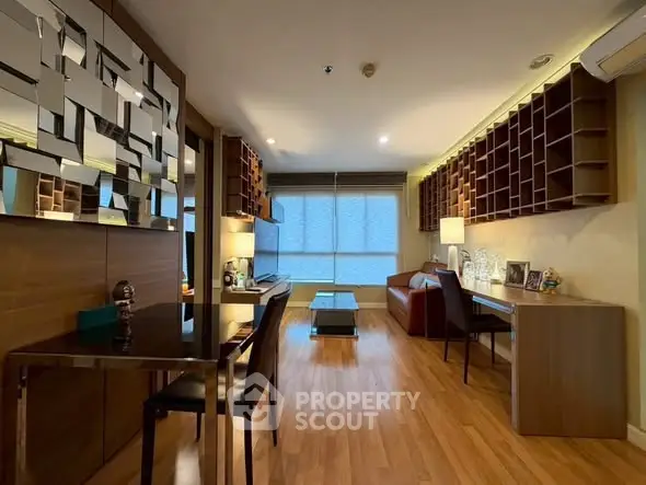 Modern living room with stylish decor and wooden flooring