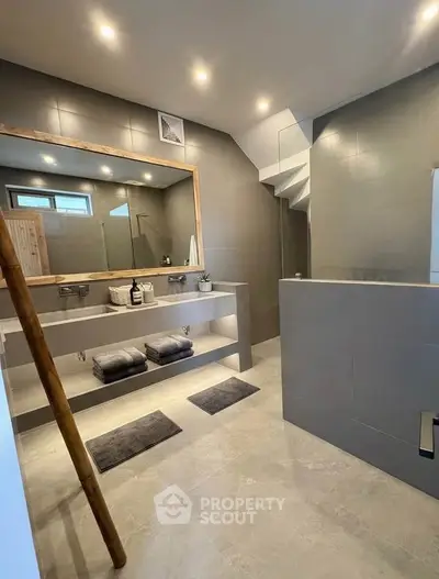 Luxurious modern bathroom with sleek design and spacious layout