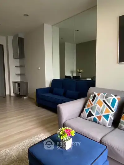Modern living room with stylish furniture and decorative accents