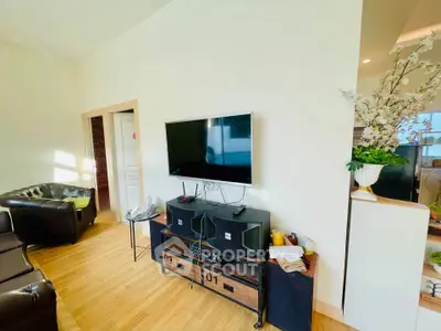 Modern living room with sleek TV setup and stylish decor