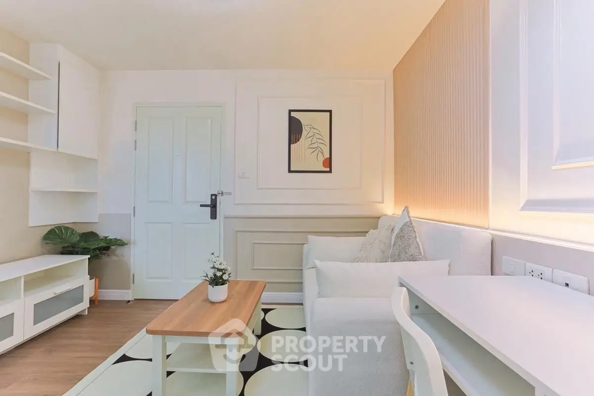 Modern living room with stylish decor and cozy seating area, perfect for relaxation and entertainment.