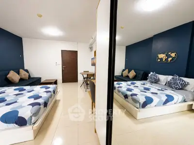Modern studio apartment with stylish decor and cozy furnishings