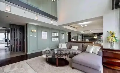 Spacious modern living room with elegant decor and open layout in luxury apartment