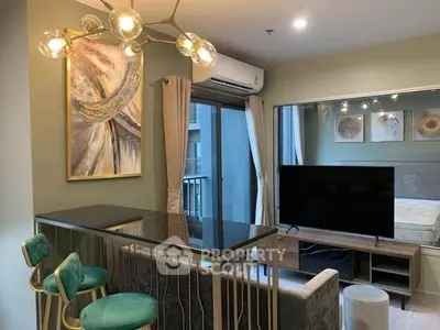 Modern living room with stylish decor and balcony view