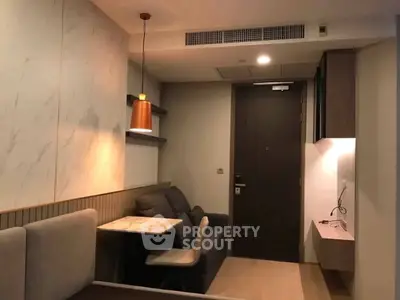 Modern apartment interior with cozy dining nook and stylish lighting