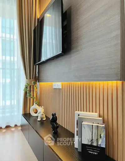 Modern living room with stylish TV setup and elegant decor