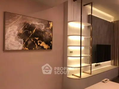 Modern living room with elegant wall art and stylish shelving unit