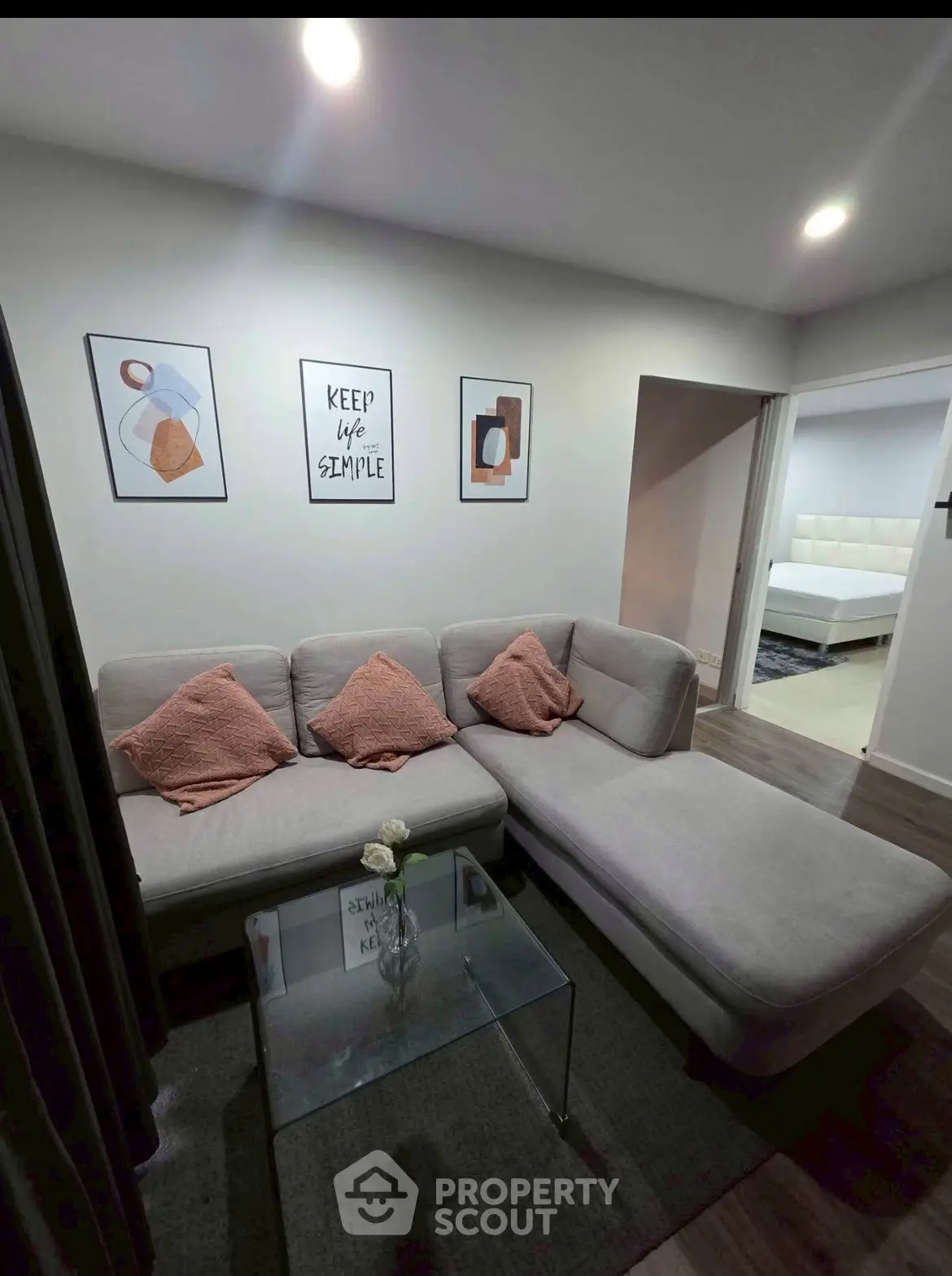 Cozy living room with modern decor and comfortable sectional sofa.