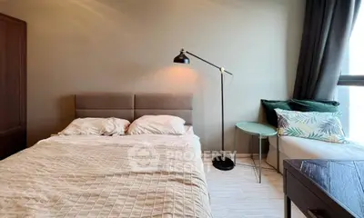 Cozy bedroom with stylish decor and natural light