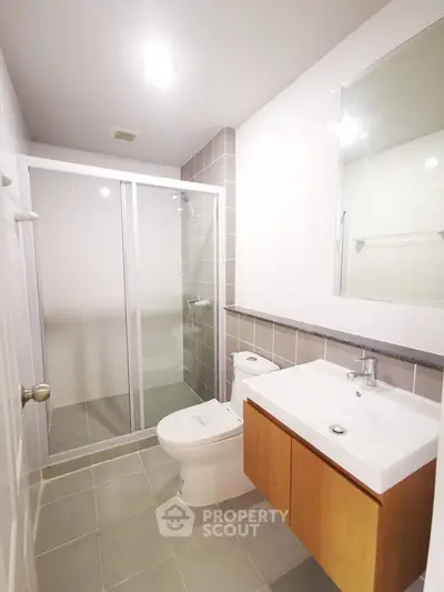 Modern bathroom with sleek shower and contemporary fixtures