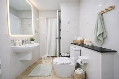 Modern bathroom with elegant fixtures and soft lighting