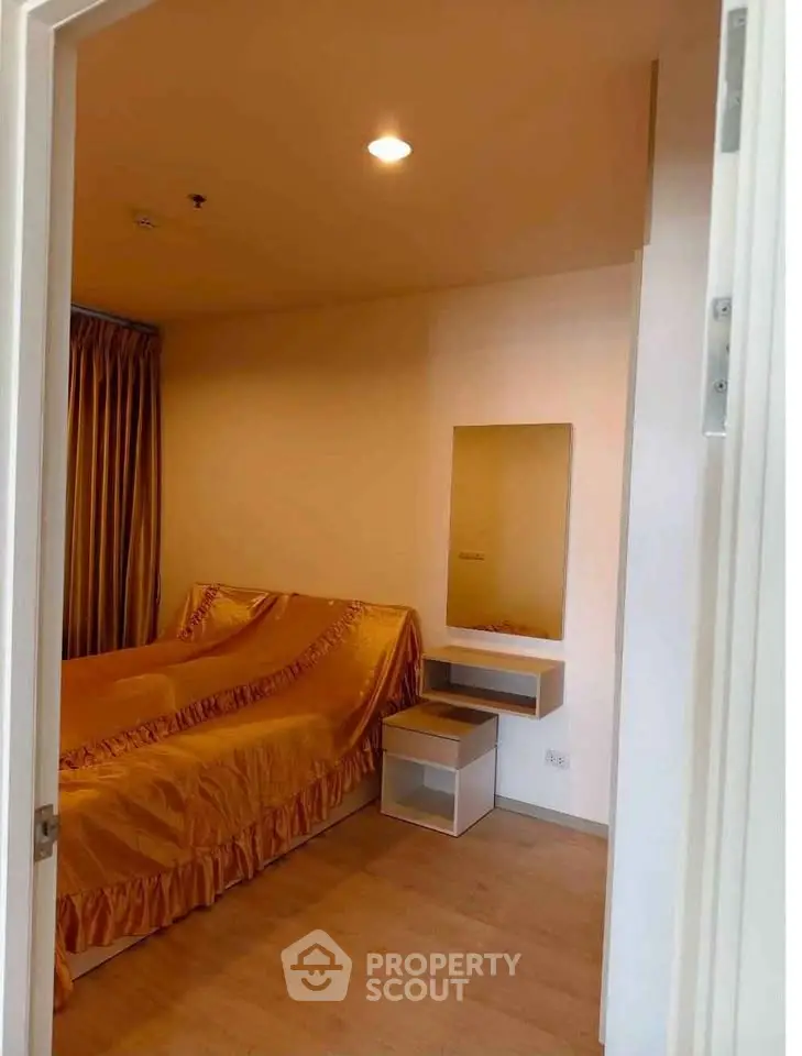 Cozy bedroom with elegant gold bedding and modern decor