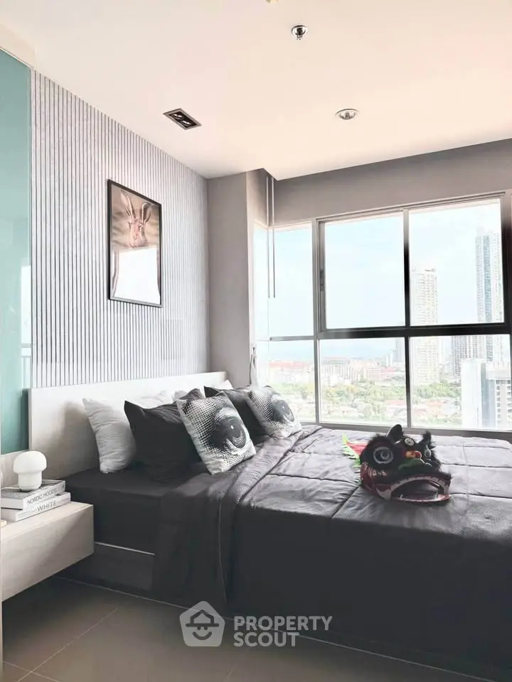 Modern bedroom with city view and stylish decor