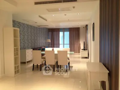 Spacious modern living room with elegant decor and ample natural light