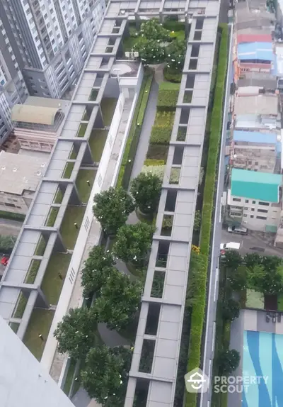 Stunning aerial view of modern rooftop garden in urban high-rise building